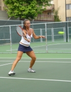 Suzanna hitting a volley